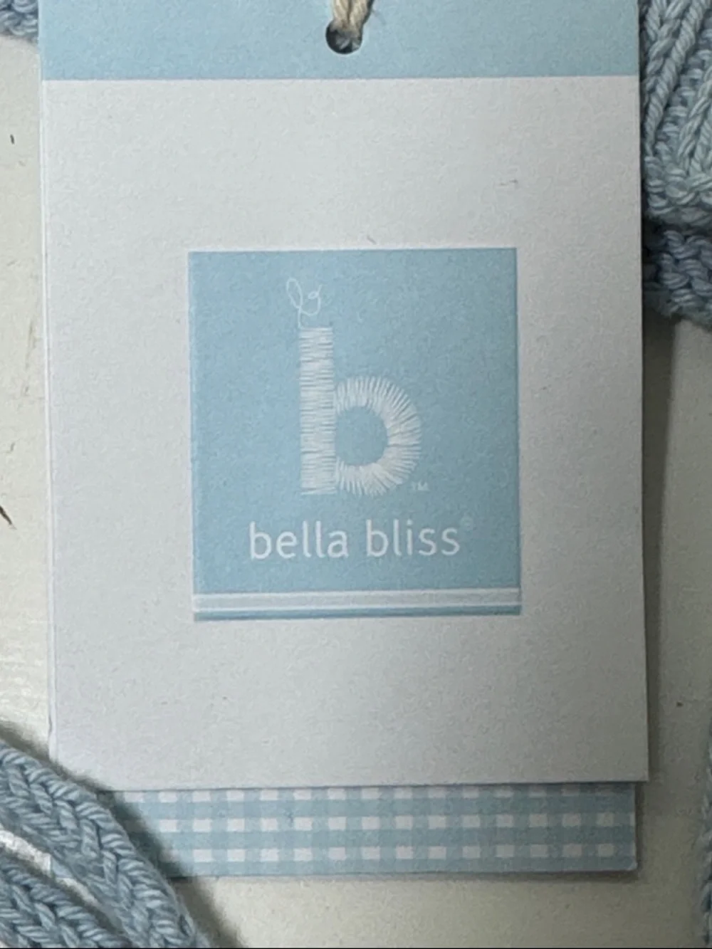 NWT Bella Bliss blue and white cotton child’s hat with ear flaps and ties.